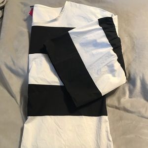 Short sleeve blouse with bell sleeves.